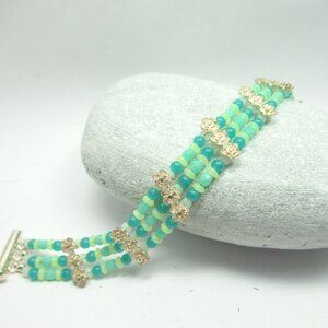 Uranium glass bead and Sterling silver bead bracelet